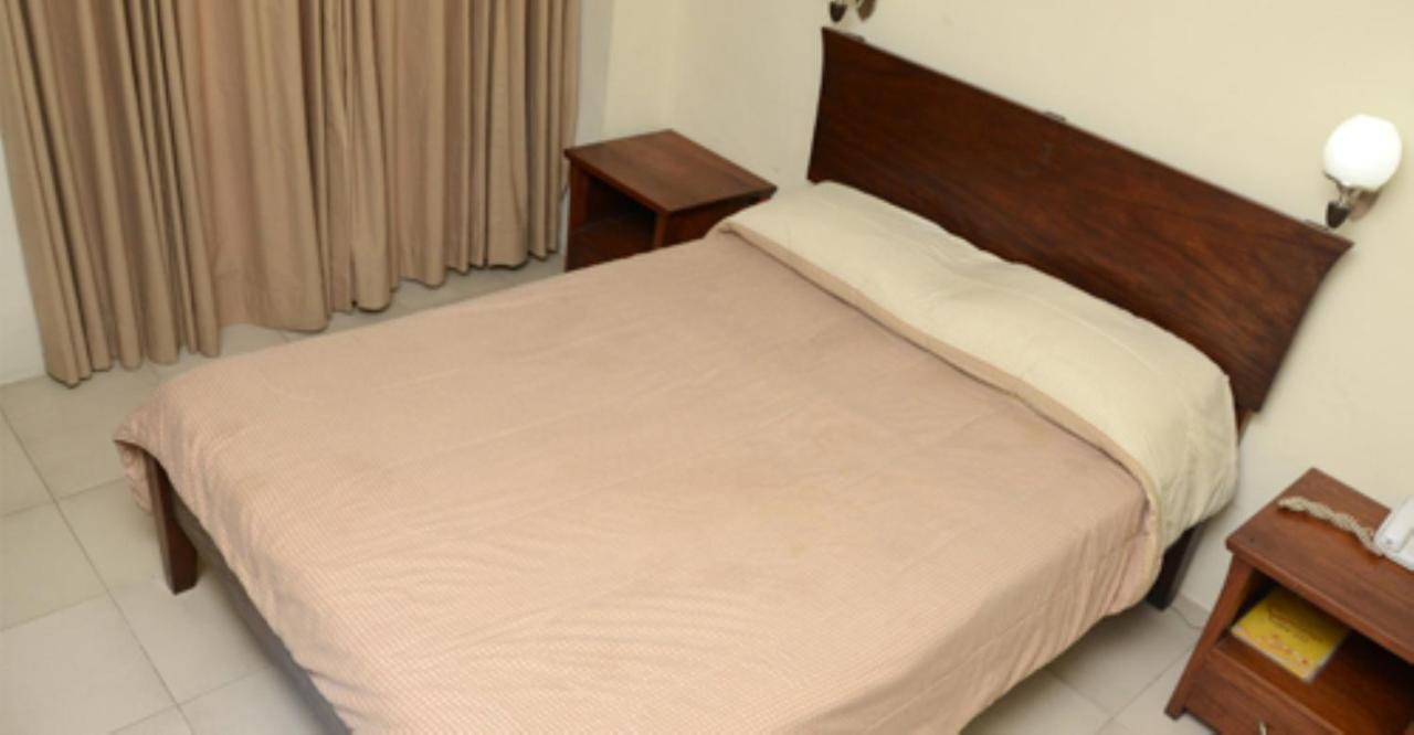 Isabel Suites Лаоаг Номер фото